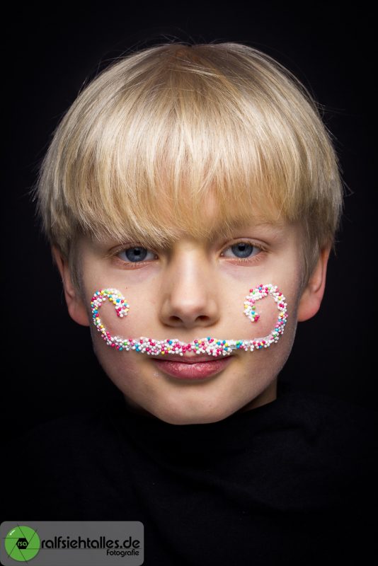 Ein Zwirbel-Bart aus Zuckerperlen